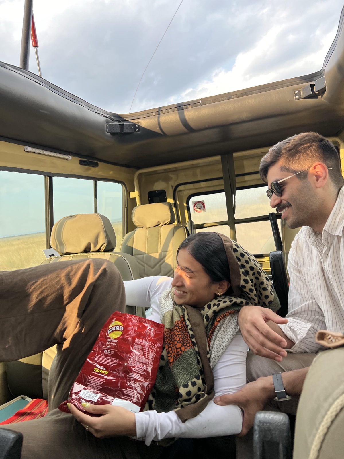 Our favorite trip was to Kenya with our siblings! Here's Suvi getting yeeted during our safari and Nikhit coming to the rescue (as usual).